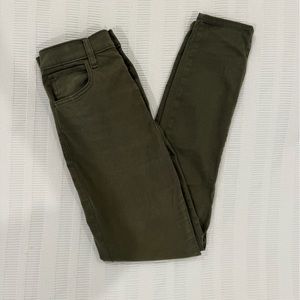 Green button fly jeans
